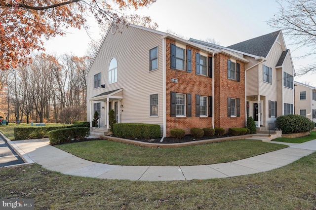 view of front of house with a front yard