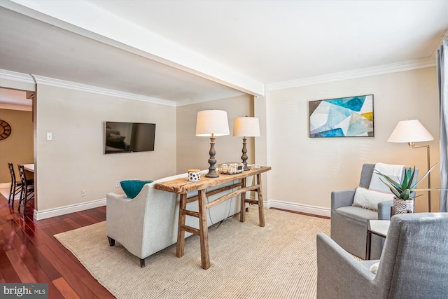 living room with hardwood / wood-style floors and ornamental molding