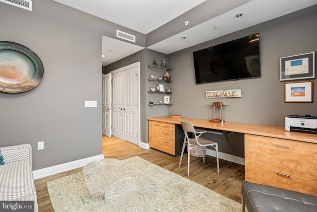 office space featuring hardwood / wood-style flooring