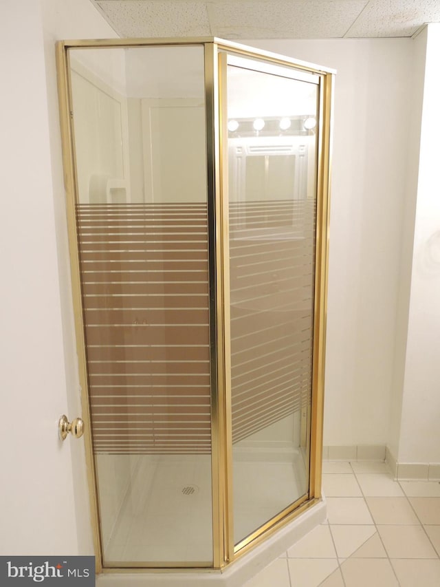 interior space with a shower with shower door