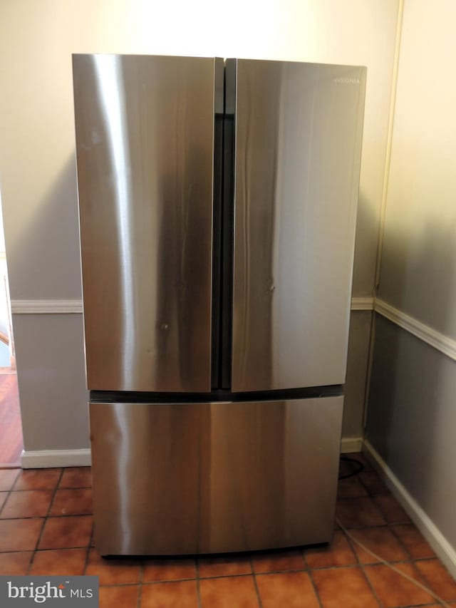 interior details featuring stainless steel fridge