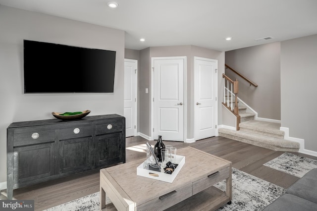 living room with hardwood / wood-style flooring