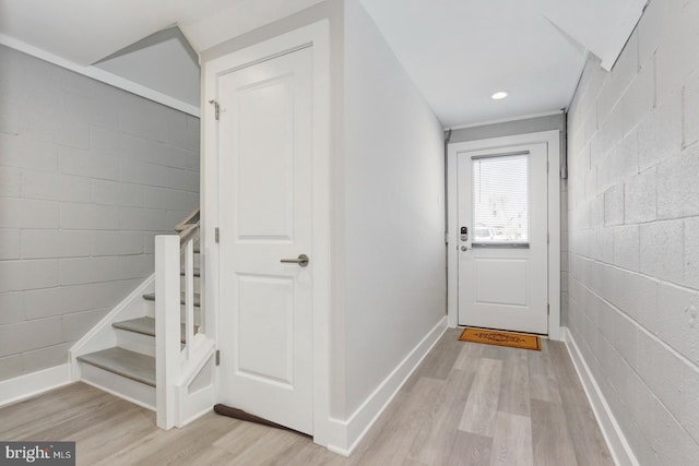 doorway to outside with light hardwood / wood-style floors