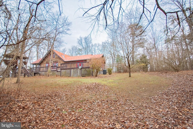 view of yard with a deck