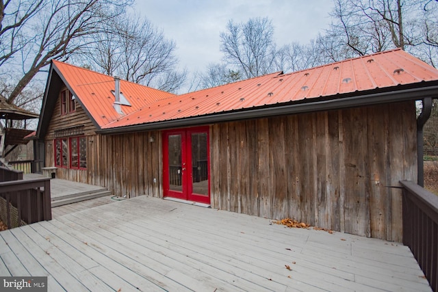 wooden deck featuring french doors