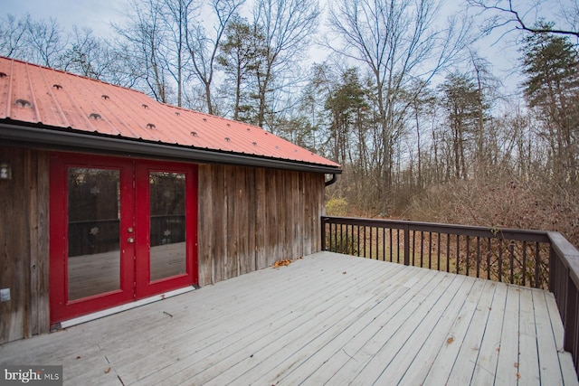 wooden terrace featuring french doors