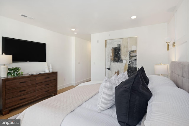 bedroom featuring light hardwood / wood-style flooring