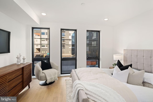 bedroom with light hardwood / wood-style flooring