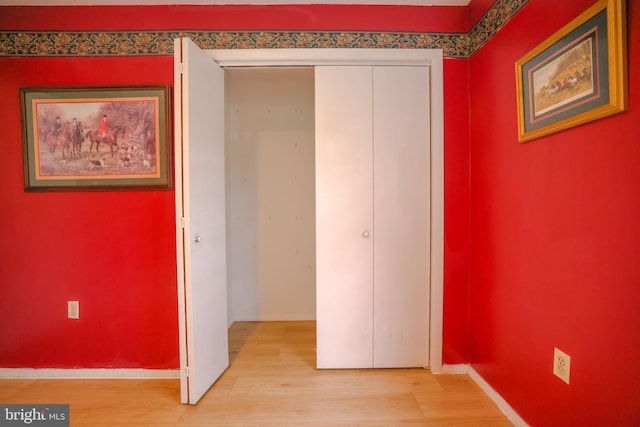 hall featuring light hardwood / wood-style floors