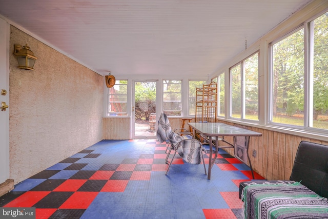 sunroom featuring plenty of natural light