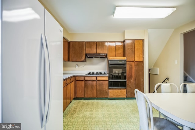 kitchen featuring white appliances