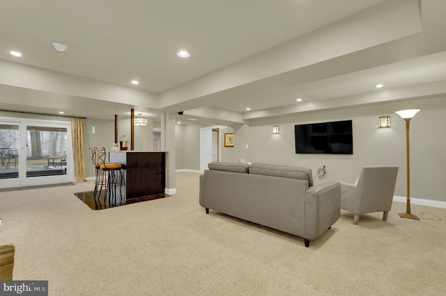 living room with light carpet and indoor bar