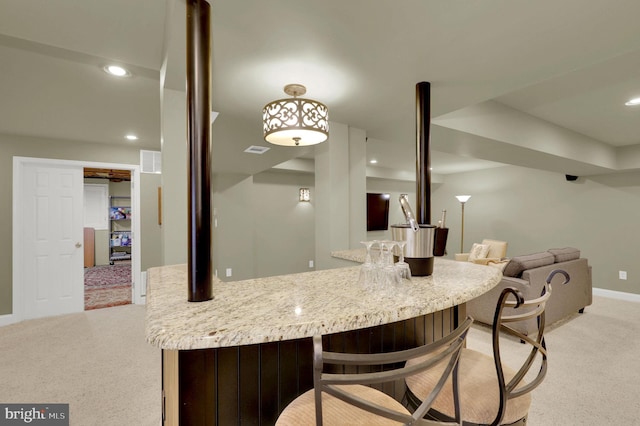 kitchen with light colored carpet