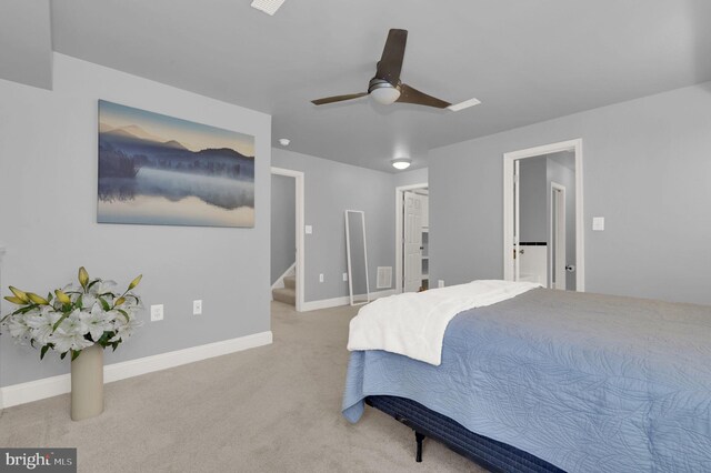 bedroom featuring ceiling fan and light colored carpet