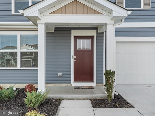 property entrance featuring a garage