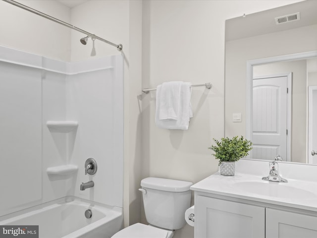 full bathroom with shower / washtub combination, vanity, and toilet