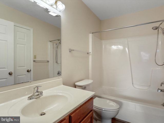 full bathroom featuring vanity, toilet, and shower / washtub combination