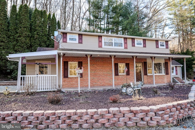 6381 Glatfelters Station Rd, Seven Valleys, PA 17360 - view of front of home featuring covered porch and brick siding