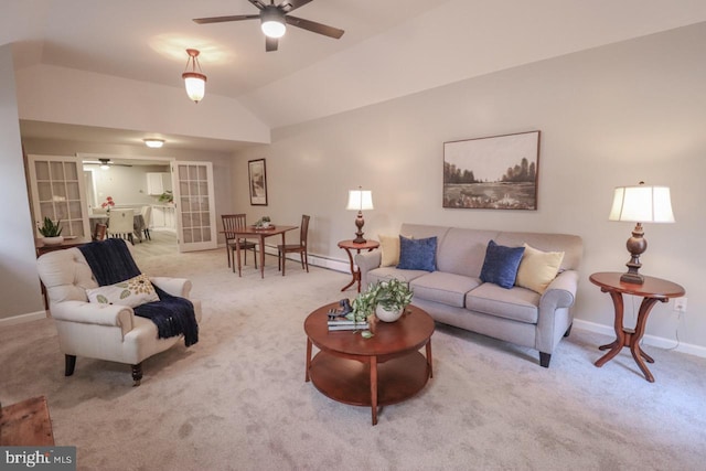 6381 Glatfelters Station Rd, Seven Valleys, PA 17360 - carpeted living room with a ceiling fan, baseboards, and vaulted ceiling