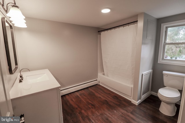 full bathroom with a baseboard heating unit, toilet, vanity, bathtub / shower combination, and hardwood / wood-style flooring