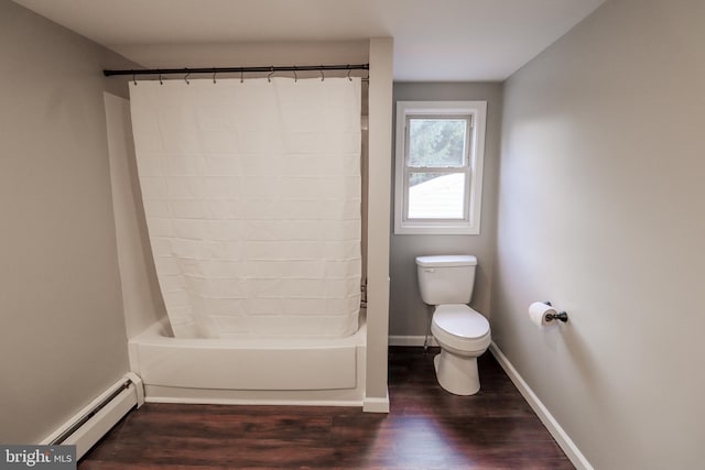 bathroom with toilet, hardwood / wood-style floors, a baseboard radiator, and bathing tub / shower combination