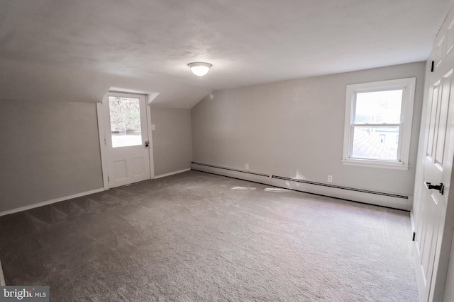 bonus room featuring carpet flooring, a baseboard radiator, and lofted ceiling