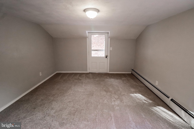 bonus room featuring a textured ceiling, carpet floors, a baseboard radiator, and lofted ceiling