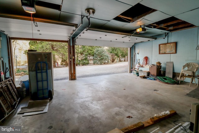 6381 Glatfelters Station Rd, Seven Valleys, PA 17360 - garage featuring a garage door opener