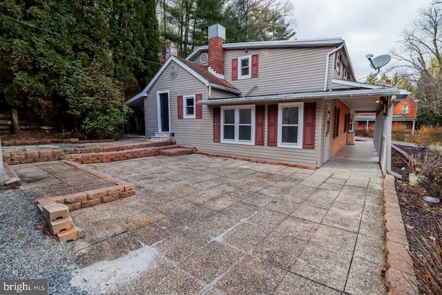 6381 Glatfelters Station Rd, Seven Valleys, PA 17360 - back of house featuring a chimney