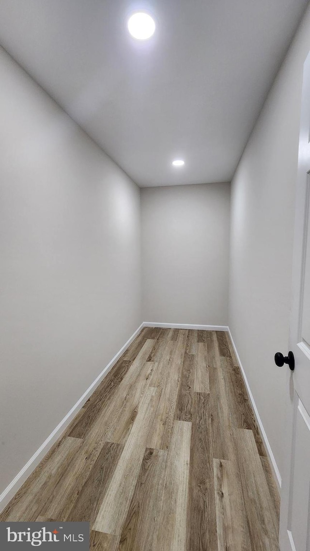 spare room with light hardwood / wood-style floors