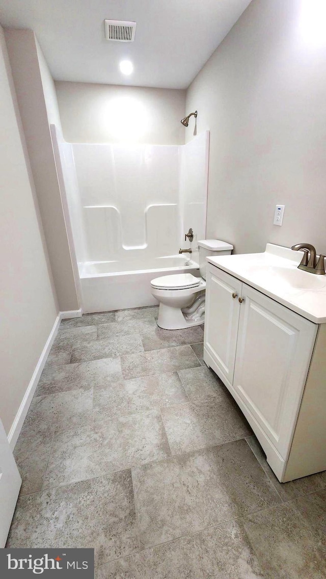 full bathroom with vanity, toilet, and shower / tub combination