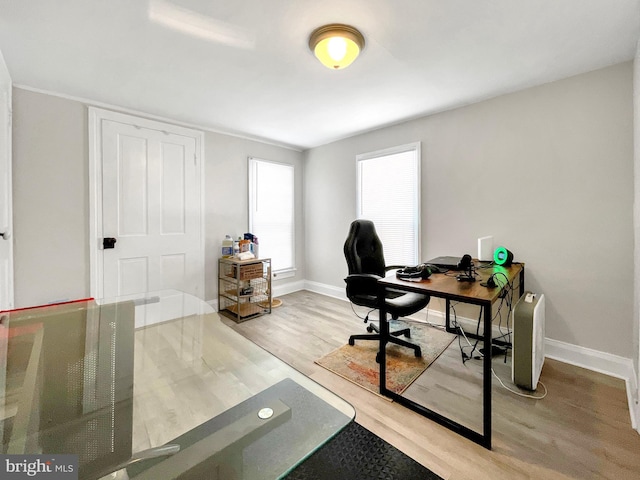 office space with hardwood / wood-style flooring