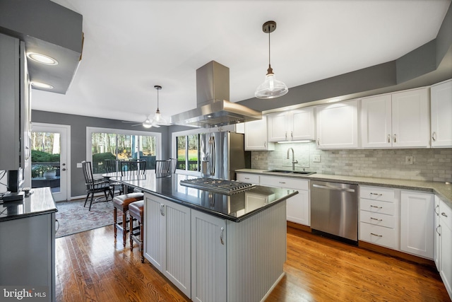 kitchen with white cabinets, sink, and stainless steel appliances