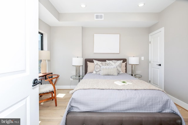 bedroom with light wood-type flooring