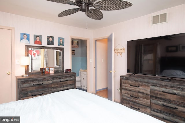 bedroom with connected bathroom and ceiling fan