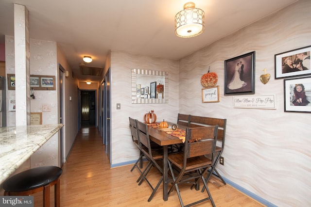 dining area featuring light hardwood / wood-style floors