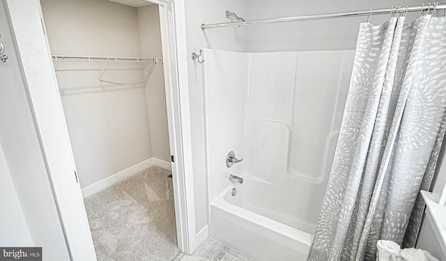 bathroom featuring shower / bath combination with curtain