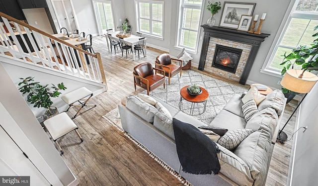 living room featuring a fireplace and hardwood / wood-style flooring