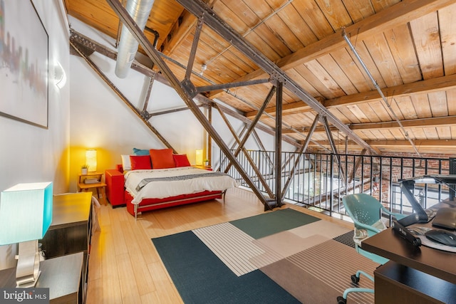 bedroom featuring beamed ceiling and wood ceiling