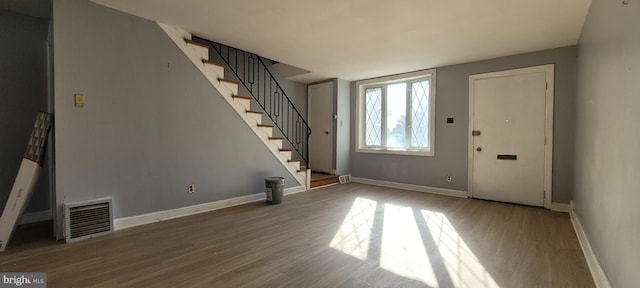 foyer with hardwood / wood-style floors