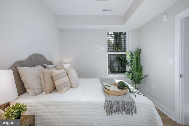 bedroom featuring hardwood / wood-style floors