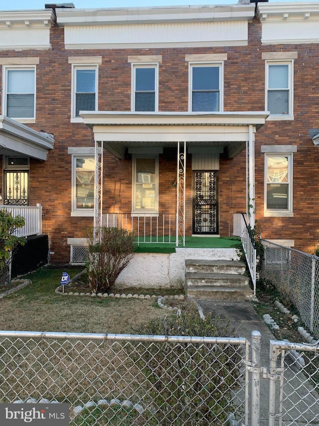 multi unit property featuring covered porch