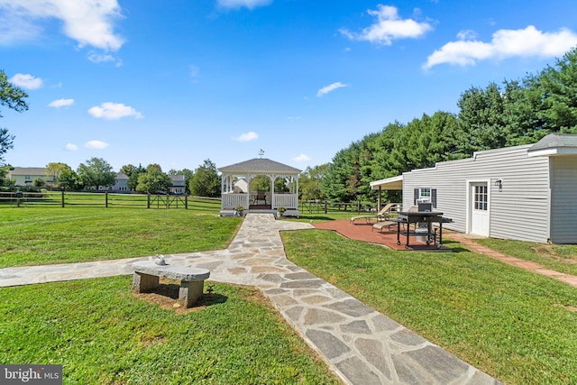 view of yard with a gazebo and a patio area