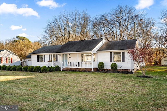 ranch-style home with a porch and a front lawn