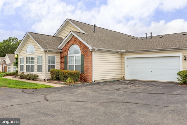 ranch-style home with a garage