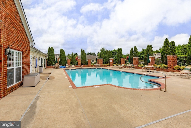 view of pool featuring a patio area