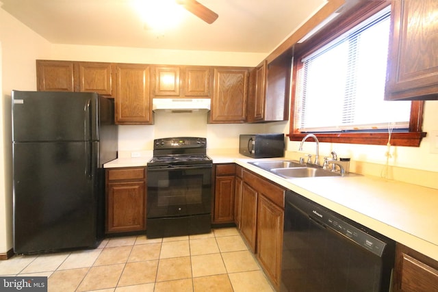 kitchen with light tile patterned floors, sink, ceiling fan, and black appliances