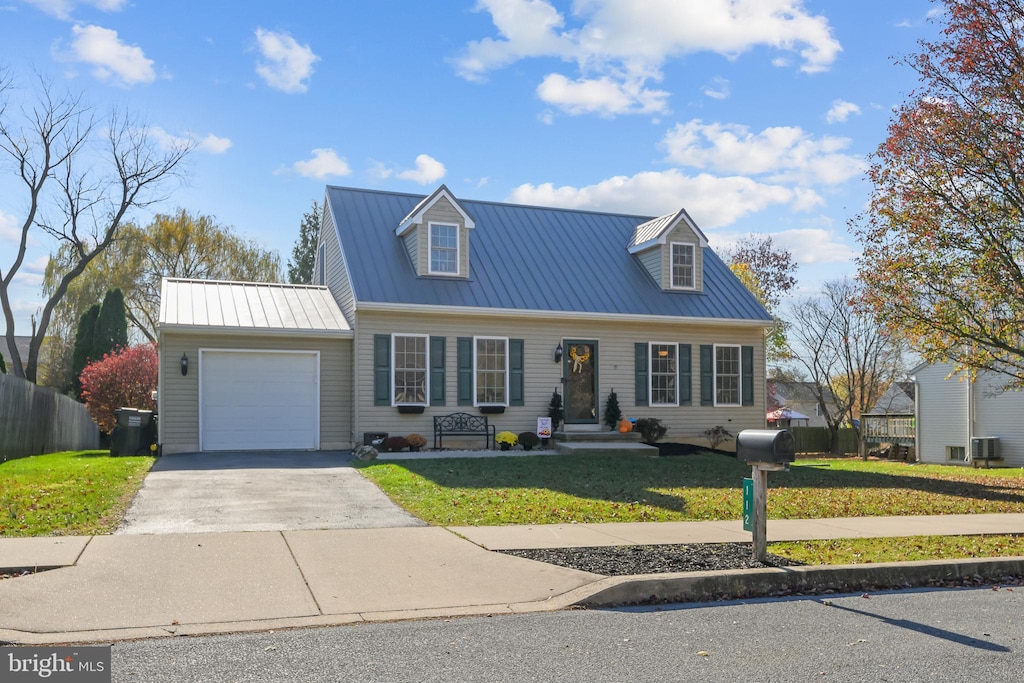 cape cod-style house with a front lawn and a garage