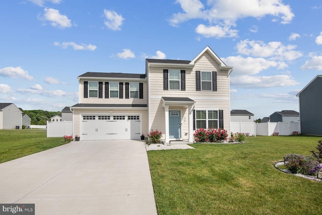 view of front of house featuring a garage and a front lawn