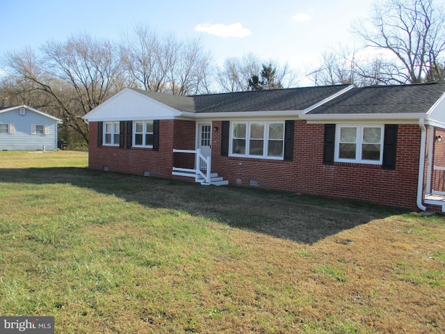 ranch-style house featuring a front yard